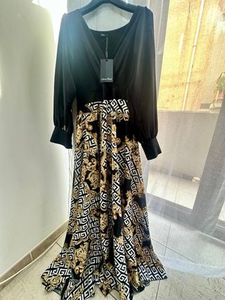 Abito lungo elegante nero e oro