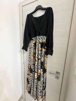Abito lungo elegante nero e oro
