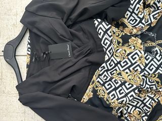 Abito lungo elegante nero e oro