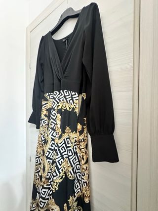 Abito lungo elegante nero e oro