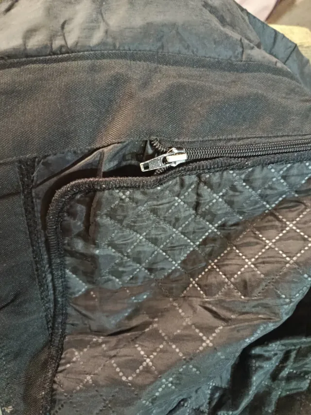 Chaqueta de moto negra y azul