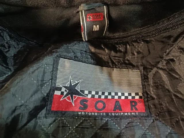 Chaqueta de moto negra y azul