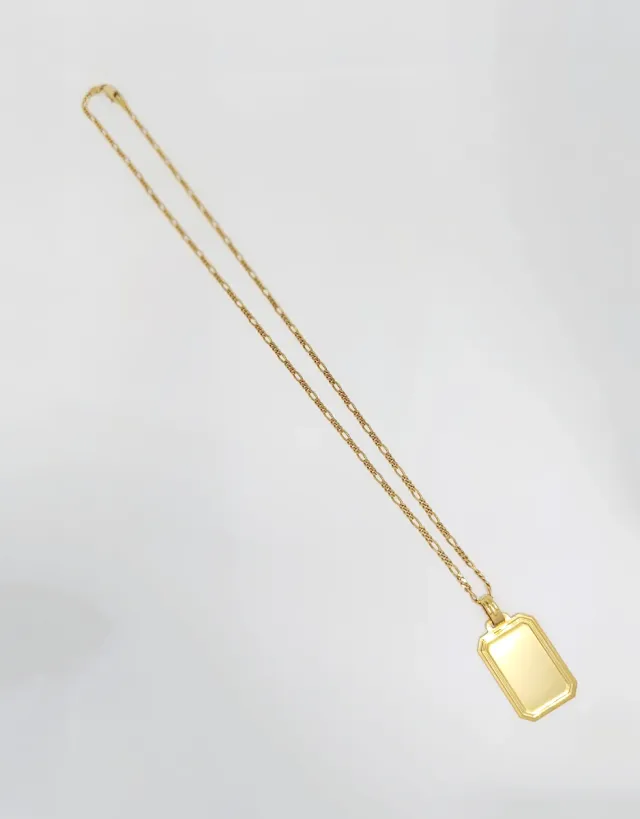 Conjunto de cadena y colgante en oro 18K