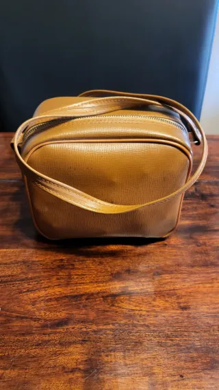 Proyector antiguo con maletín y accesorios