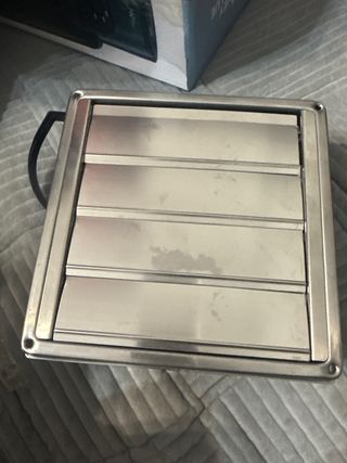 Rejilla de ventilación metálica