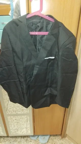 Traje chaqueta y chaleco negro