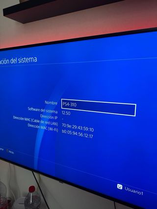 PS4 Fat 500GB + base de refrigeración y carga.