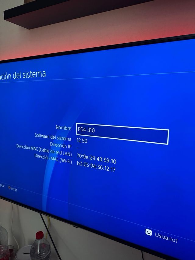 PS4 Fat 500GB + base de refrigeración y carga.