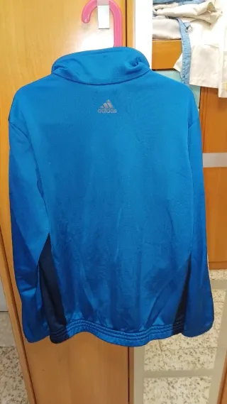 Sudadera Adidas azul con rayas blancas
