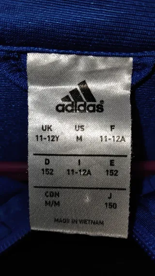 Sudadera Adidas azul con rayas blancas