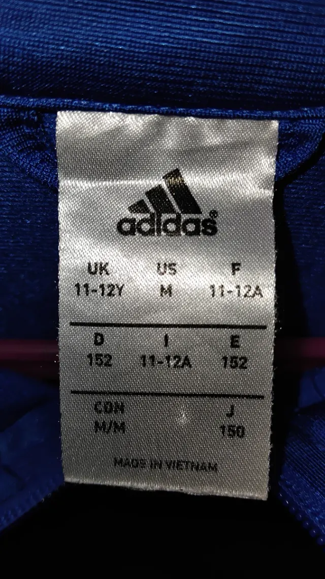 Sudadera Adidas azul con rayas blancas