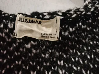 Chaqueta oversize Pull&Bear negra y blanca punto