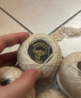 12 gomitoli e mezzo di filo 16