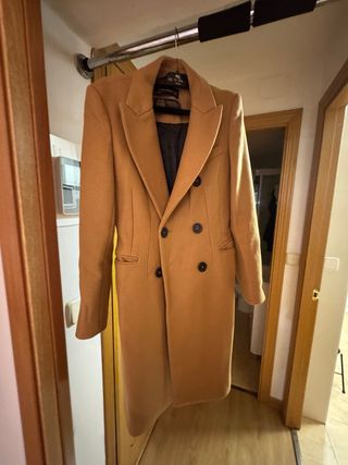 Abrigo con 2 usos