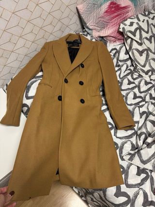 Abrigo con 2 usos