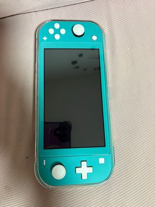 Nintendo Switch Lite + Custodia + 3 Giochi + cover