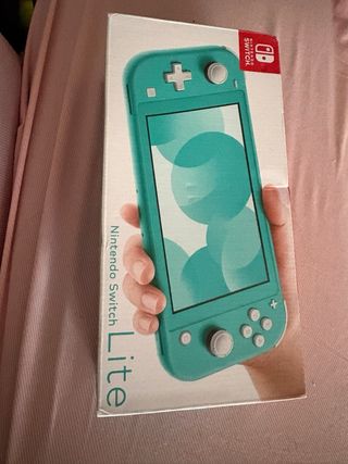 Nintendo Switch Lite + Custodia + 3 Giochi + cover