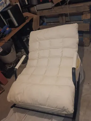 Sillón mecedora beige y negro