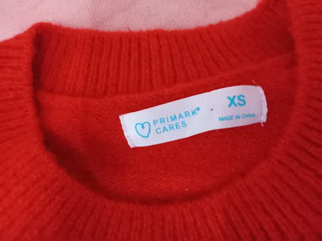 Jersey rojo Primark corazones lentejuelas Talla XS