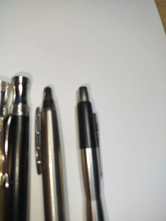 Bolígrafos Inoxcrom y Parker