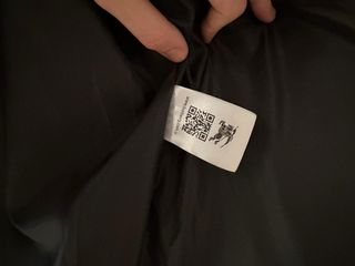 Piumino Burberry nero con dettagli scozzesi