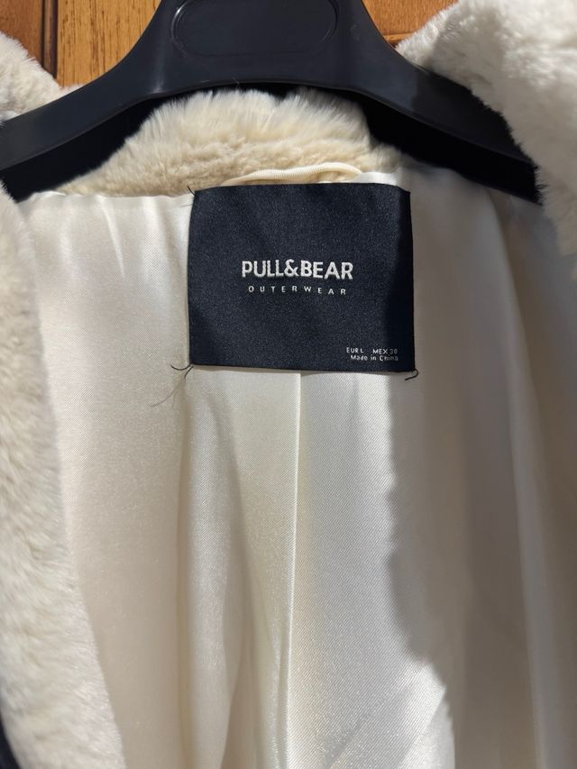 Casaco de pelo bege e preto feminino