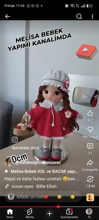 Muñeca de ganchillo rosa y amarilla