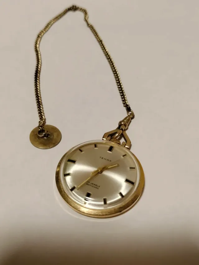 Reloj Tenax de bolsillo dorado