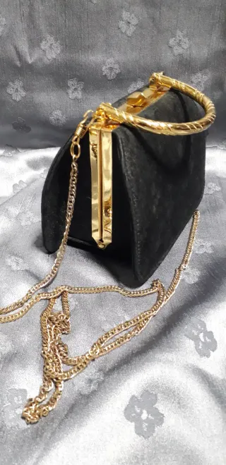 Bolso de fiesta negro y dorado