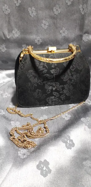 Bolso de fiesta negro y dorado