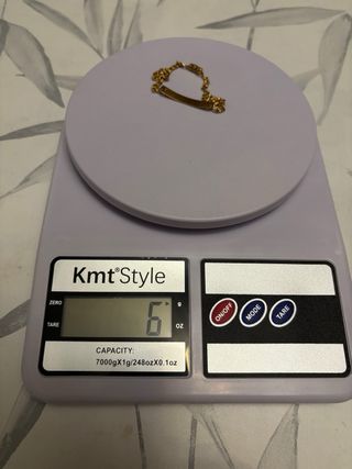 Pulsera de oro con placa