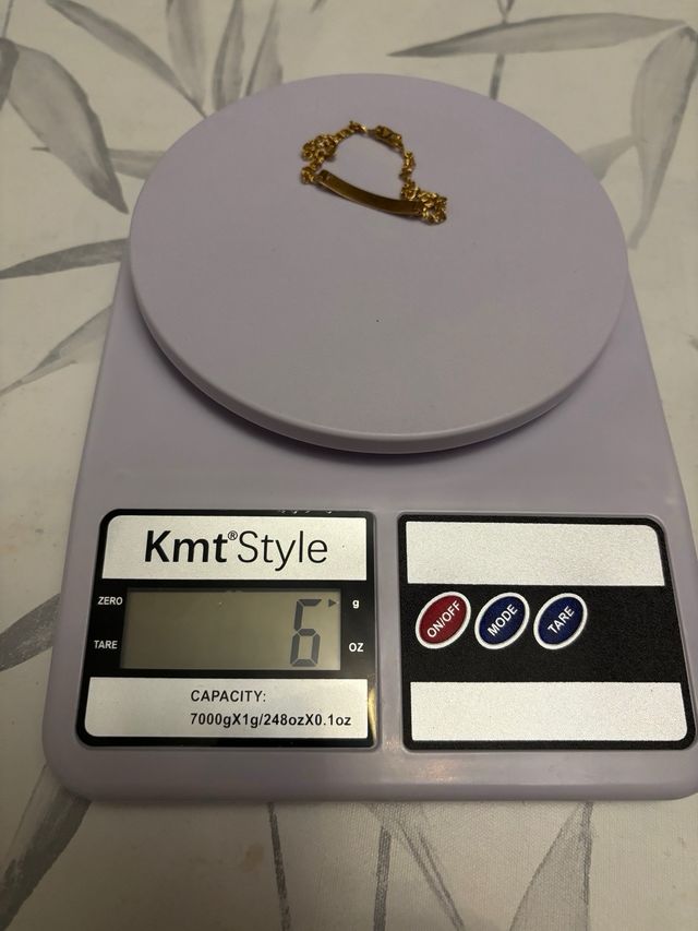 Pulsera de oro con placa