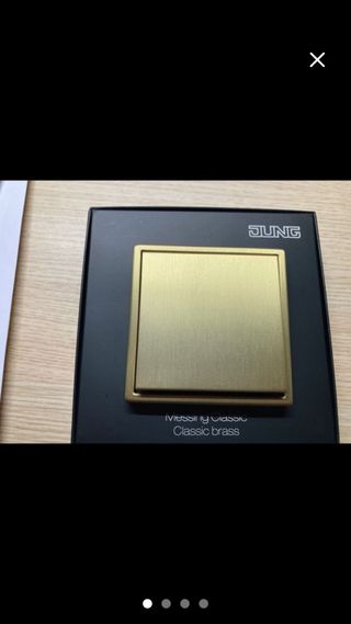 Interruptor conmutado JUNG LS 990 Latón Clásico