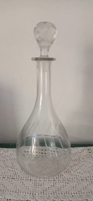 Bottiglia con tappo in vetro trasparente