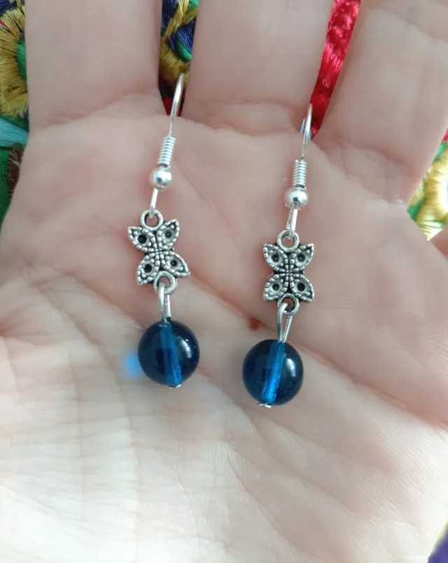 Pendientes mariposa con perla azul