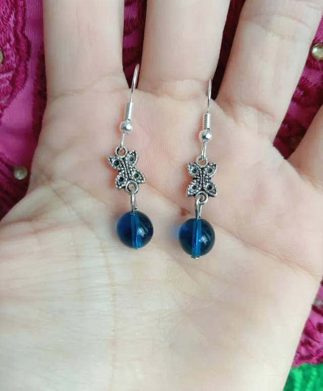 Pendientes mariposa con perla azul