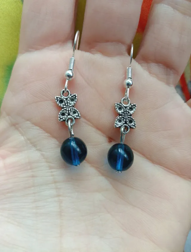 Pendientes mariposa con perla azul
