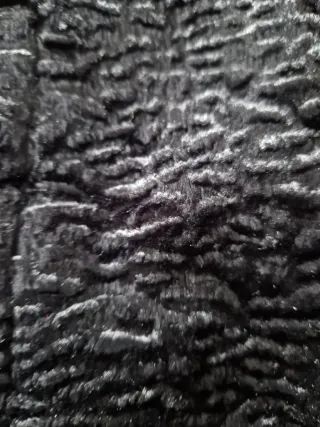 Americana negra mujer,de pelo natural, ese legalme