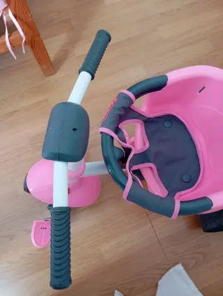 Triciclo rosa Fisher-Price
