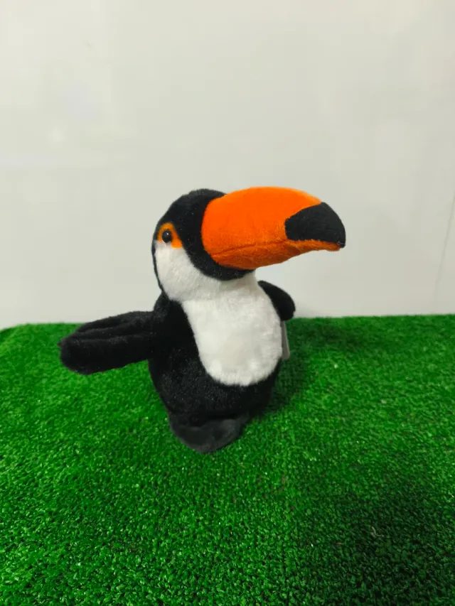 Peluche tucán que repite lo que dices