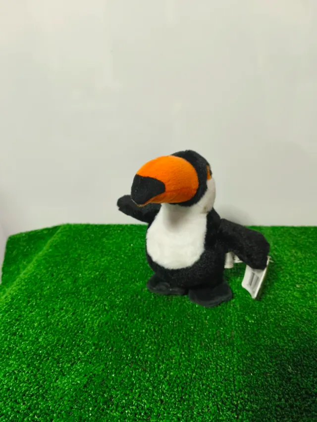 Peluche tucán que repite lo que dices