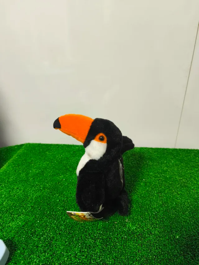 Peluche tucán que repite lo que dices