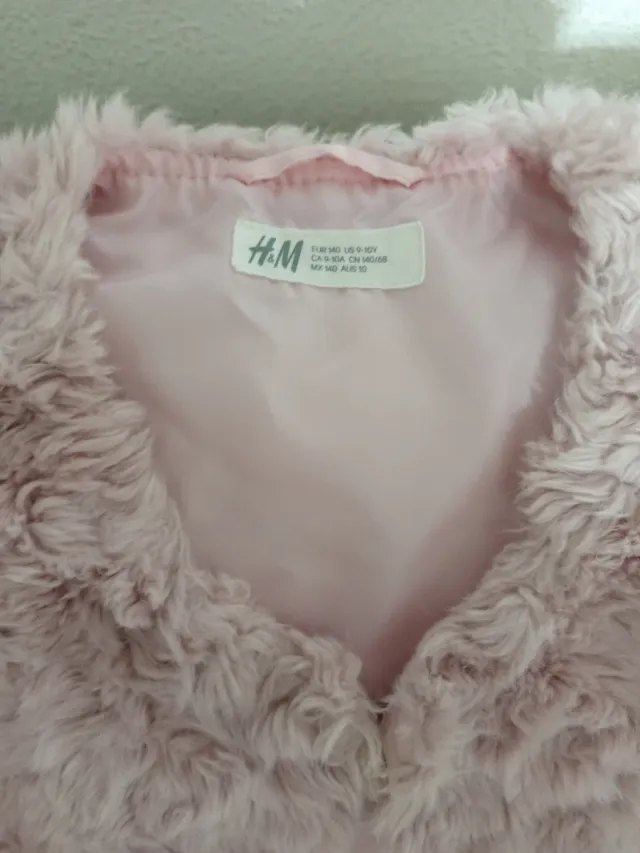 Chaleco de pelo rosa para niña