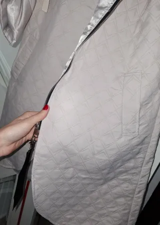 Cappotto con cappuccio color panna