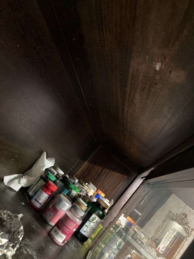 Vitrina grande de madera y cristal