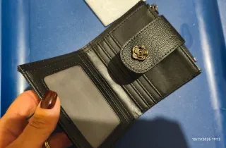 Portamonete nero trapuntato con fiore