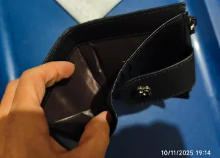 Portamonete nero trapuntato con fiore