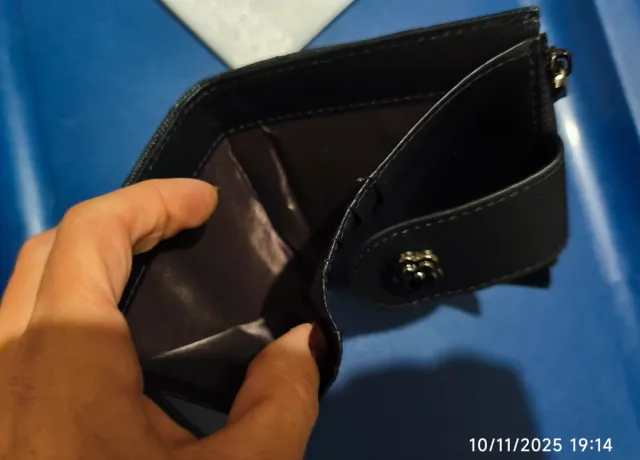 Portamonete nero trapuntato con fiore