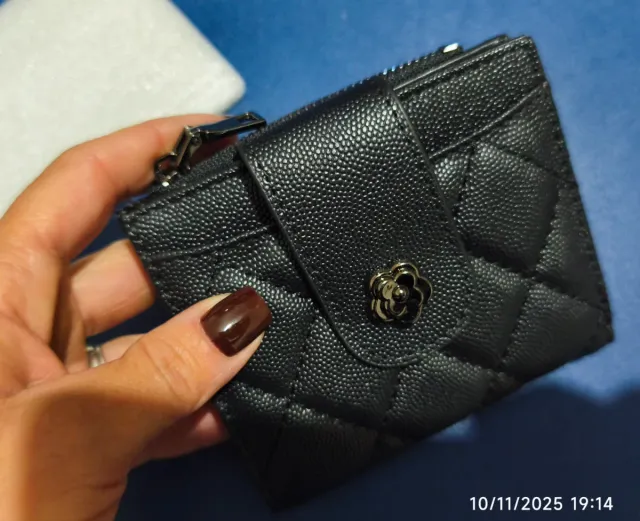 Portamonete nero trapuntato con fiore