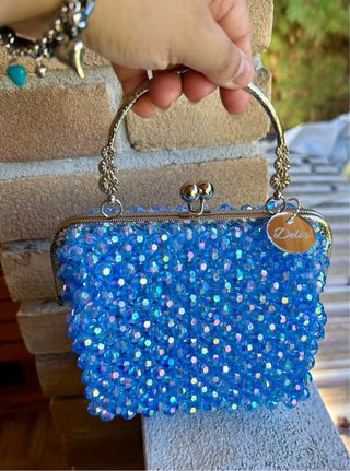 Borsa clutch perle azzurre con dettagli argento